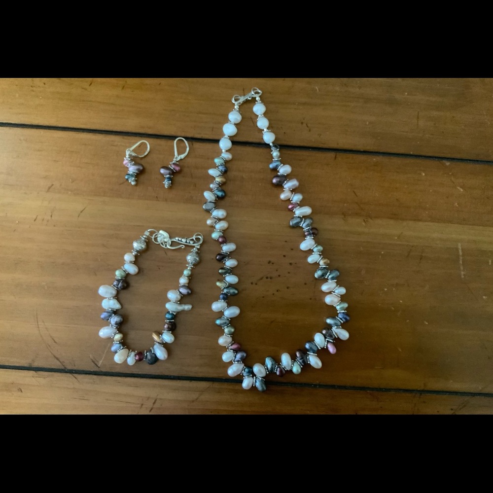 Beautiful sterling silver and colored fresh water pearl set.